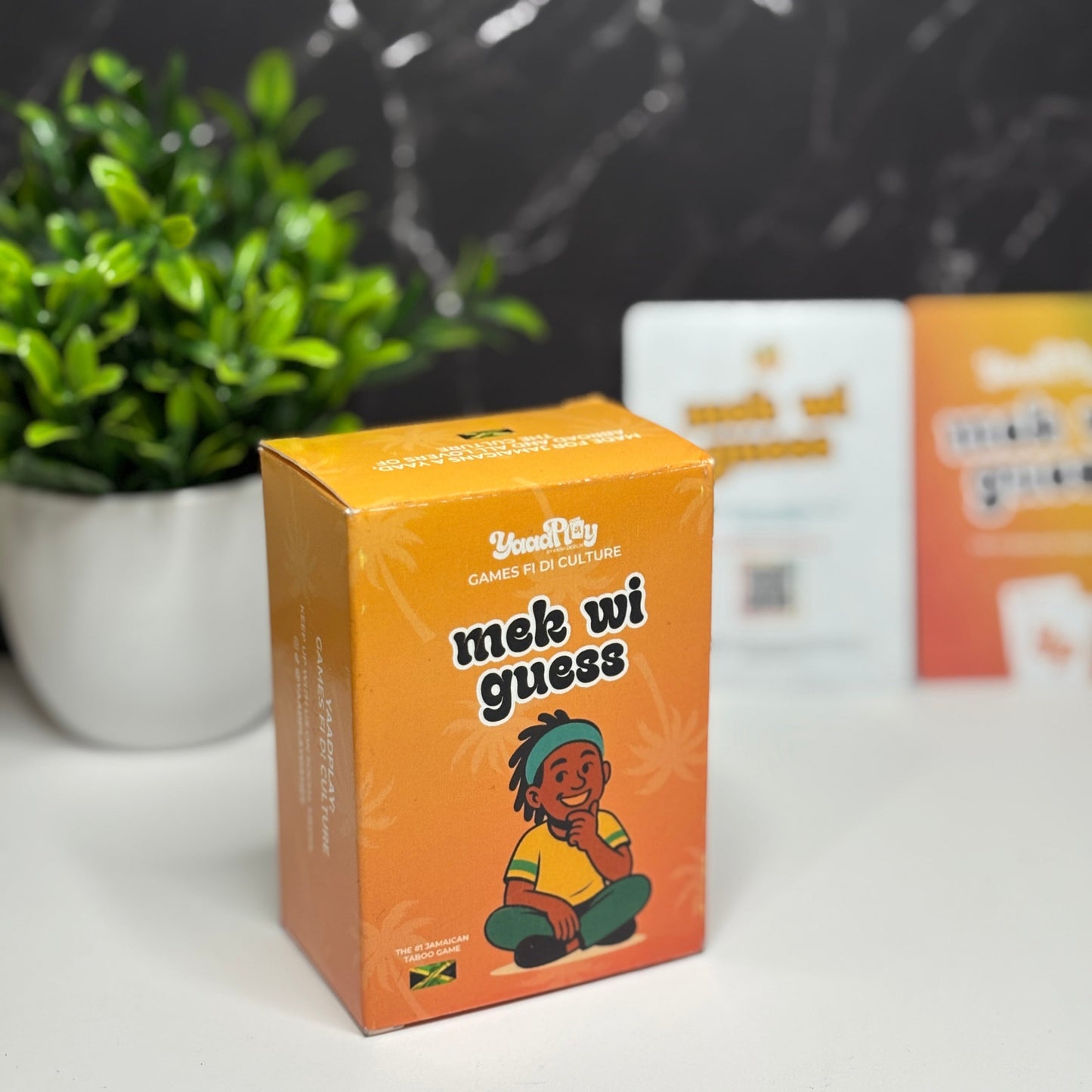Mek Wi Guess - Preorder